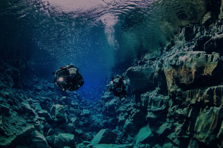 Divers underwater in the Mexican Caribbean